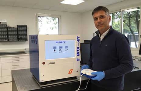 Paul Coudray alongside mask aligner UV-KUB 3, 6 inches version